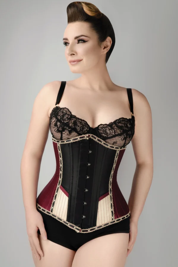 Style: Longline,Underbust Corset Features: Cord Lacing,Hip Gores,Steel Busk Colour: Burgundy Achievable Waist Reduction: 3-4" Pointed Underbust Fully Adjustable Structured Corset with Criss Cross Lacing Front and Back Modesty Panel Strong Corset Cord Lacing Strong Waist Tape 6 Suspender Loops Outer Material: 100% Polyester Lining: 100% Cotton Twill 10 x 4mm Lightweight Spiral Steel Bones, 4 x 7mm Lightweight Flat Steel Bones Busk Length: 12" (All Corset Sizes)