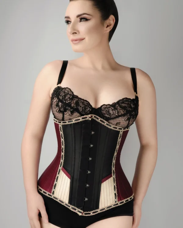 Style: Longline,Underbust Corset Features: Cord Lacing,Hip Gores,Steel Busk Colour: Burgundy Achievable Waist Reduction: 3-4" Pointed Underbust Fully Adjustable Structured Corset with Criss Cross Lacing Front and Back Modesty Panel Strong Corset Cord Lacing Strong Waist Tape 6 Suspender Loops Outer Material: 100% Polyester Lining: 100% Cotton Twill 10 x 4mm Lightweight Spiral Steel Bones, 4 x 7mm Lightweight Flat Steel Bones Busk Length: 12" (All Corset Sizes)