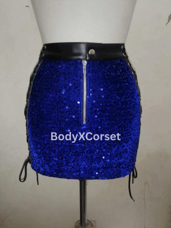 Turn heads at your next festival or rave with this fierce and fabulous Denim Overbust Corset with Fringes — a bold mix of western flair, Y2K sass, and serious waist sculpting power.  Handcrafted for comfort and style, this steel boned denim corset features flattering overbust support and playful fringe details that move as you dance. Whether you're pairing it with high-rise shorts, a maxi skirt, or layering it over a sheer top, this custom-made plus size corset is built to shape your curves and elevate your summer vibe.  Perfect for festival fashion, rave outfits, or just showing off your bold, confident energy!  🛠️ Construction & Materials: Made from high-quality denim fabric—soft, breathable, and summer-ready  Reinforced with 24 spiral steel bones for strong yet flexible waist support  Inner layer is cotton-lined for skin comfort and sweat absorption  Back lace-up closure with durable grommets for custom tightening  Structured with a flat steel front busk to ensure secure shaping and bust lift  Handmade and tailored to your measurements for a perfect, body-hugging fit  ✨ Design & Features: Overbust corset style—offers bust support without needing a bra  Eye-catching denim fabric gives casual-cool vibes with an edgy twist  Fringe detailing adds drama and movement—perfect for dancing at raves or festivals  Custom sizing available for plus size and all body types  Great as a statement top or as part of a layered rave/festival outfit  Shapes the waist beautifully while still being breathable and flexible  Whether you're headed to a summer concert, a themed party, or just love bold fashion, this denim waist trainer corset with fringe brings fun and functionality together in one stunning piece.